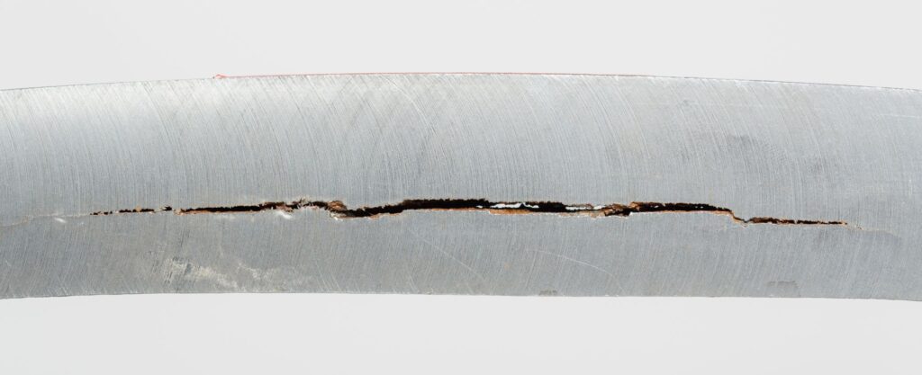 Hydrogen Embrittlement, also known as Hydrogen Induced Cracking (HIC)